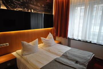 Фото номера Двухместный номер Делюкс с 2 отдельными кроватями Отель Hotel Malinowski Economy г. Гливице 15