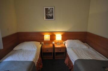 Фото номера Двухместный номер Делюкс с 2 отдельными кроватями Отель Hotel Malinowski Economy г. Гливице 14