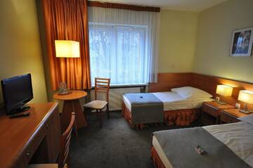 Фото номера Двухместный номер Делюкс с 2 отдельными кроватями Отель Hotel Malinowski Economy г. Гливице 9