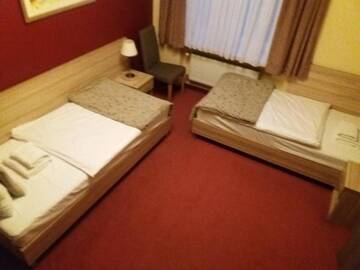 Фото номера Двухместный номер с 2 отдельными кроватями Отель Hotel Arsenał г. Гливице 2
