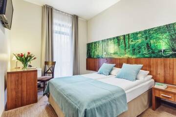 Фото номера Двухместный номер Комфорт с 1 кроватью размера «queen size» Отель Hotel Modrzewiowy Dwór г. Гливице 3