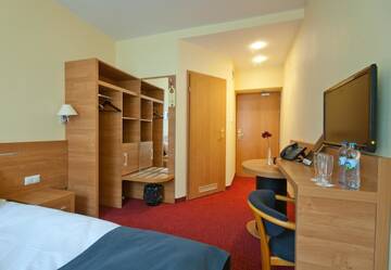 Фото номера Двухместный номер с 2 отдельными кроватями Отель Hotel Malinowski Business г. Гливице 2